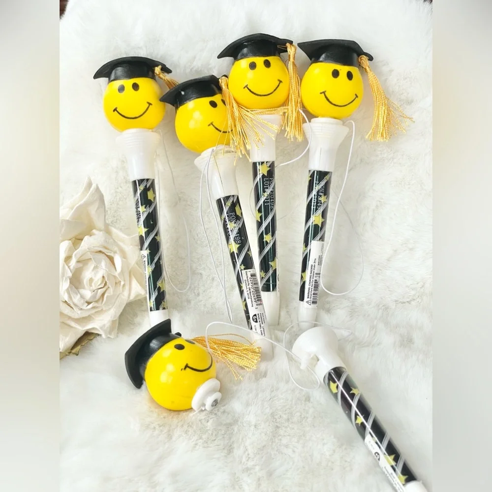 New with tags SPRING LOADED GRADUATION POP OFFS Set of 5. GRAD CAP with TASSEL